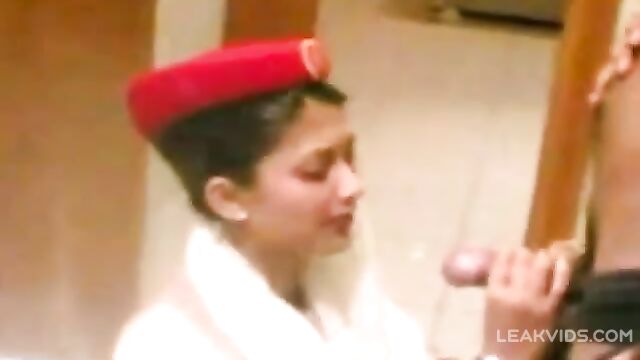 Emirates Airline Flight Attendant Pleasures Passenger with Blowjob - 2 image