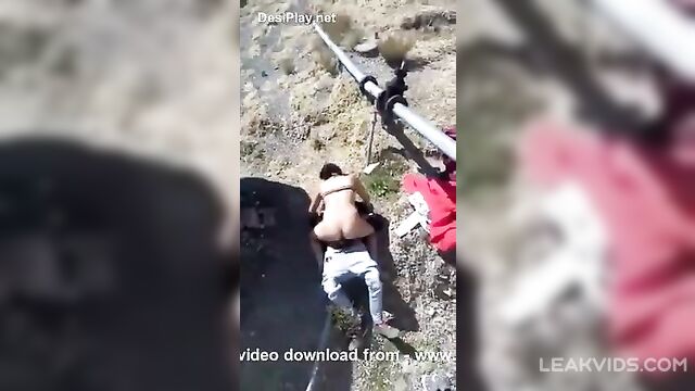 Couple fucking in open land recorded by stranger video leaked - 1 image