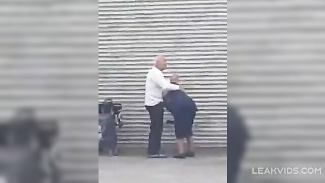 Hot Grandma caught giving a blowjob to grandpa in public - 2 image