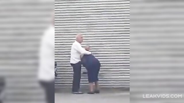 Hot Grandma caught giving a blowjob to grandpa in public - 4 image