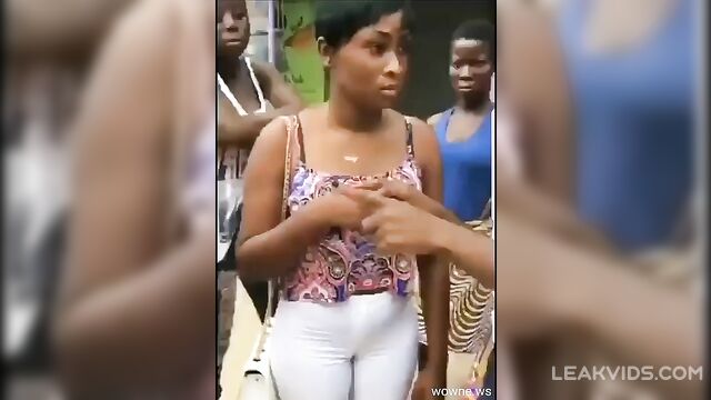 Violent street fight of African women