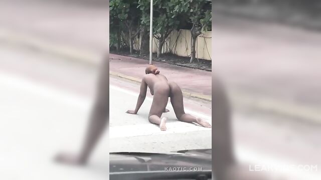 Ebony Woman having sex with invisible devil on the road