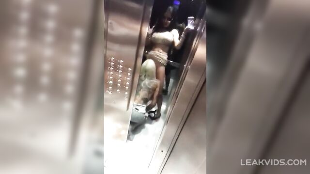Sexy whores licking each other in the elevator