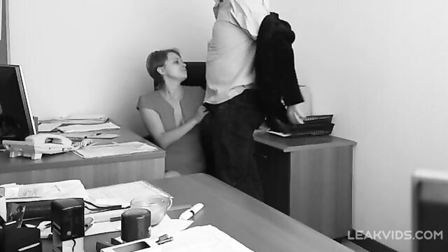 Kinky boss fucks his sexy employer at the office table and films it on hidden cam - 1 image