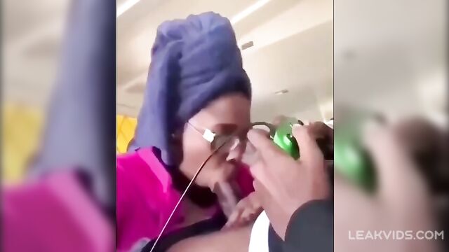 Ebony mom sucks her son's dick while playing - 1 image