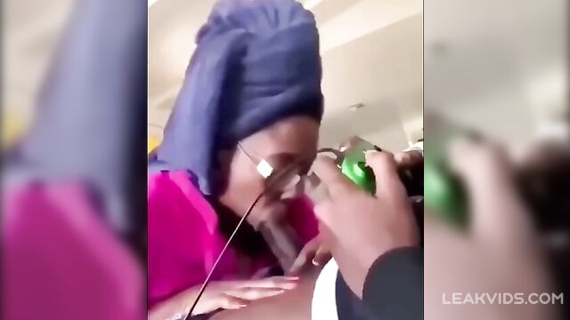 Ebony mom sucks her son's dick while playing