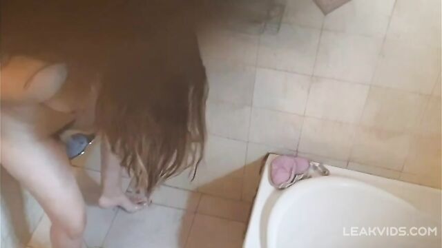 Brother Peeks at naked Arab sister masturbating in the shower - 1 image