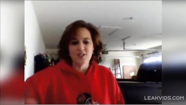 Redheaded mommy shows big bouncy boobs on camera to her daughter's boyfriend - 2 image