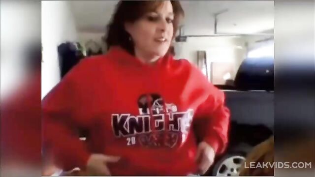 Redheaded mommy shows big bouncy boobs on camera to her daughter's boyfriend