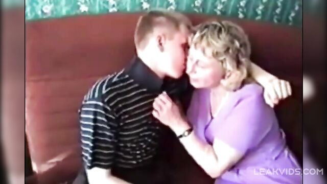 Excited lecherous mom seduces her son and asks him to cum in her pussy - 1 image