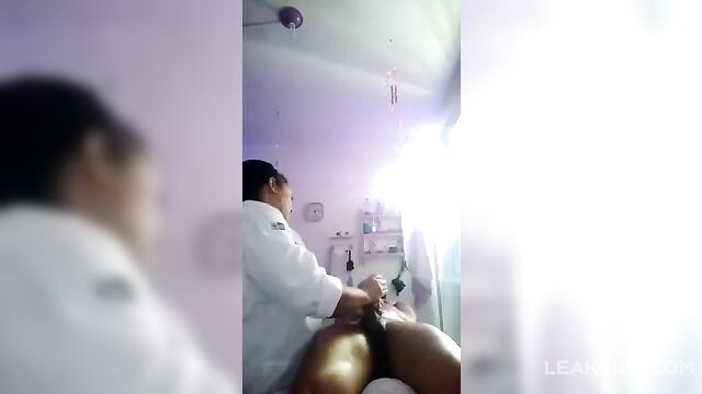 Nurse jerking off her client's dick at the spa - 4 image